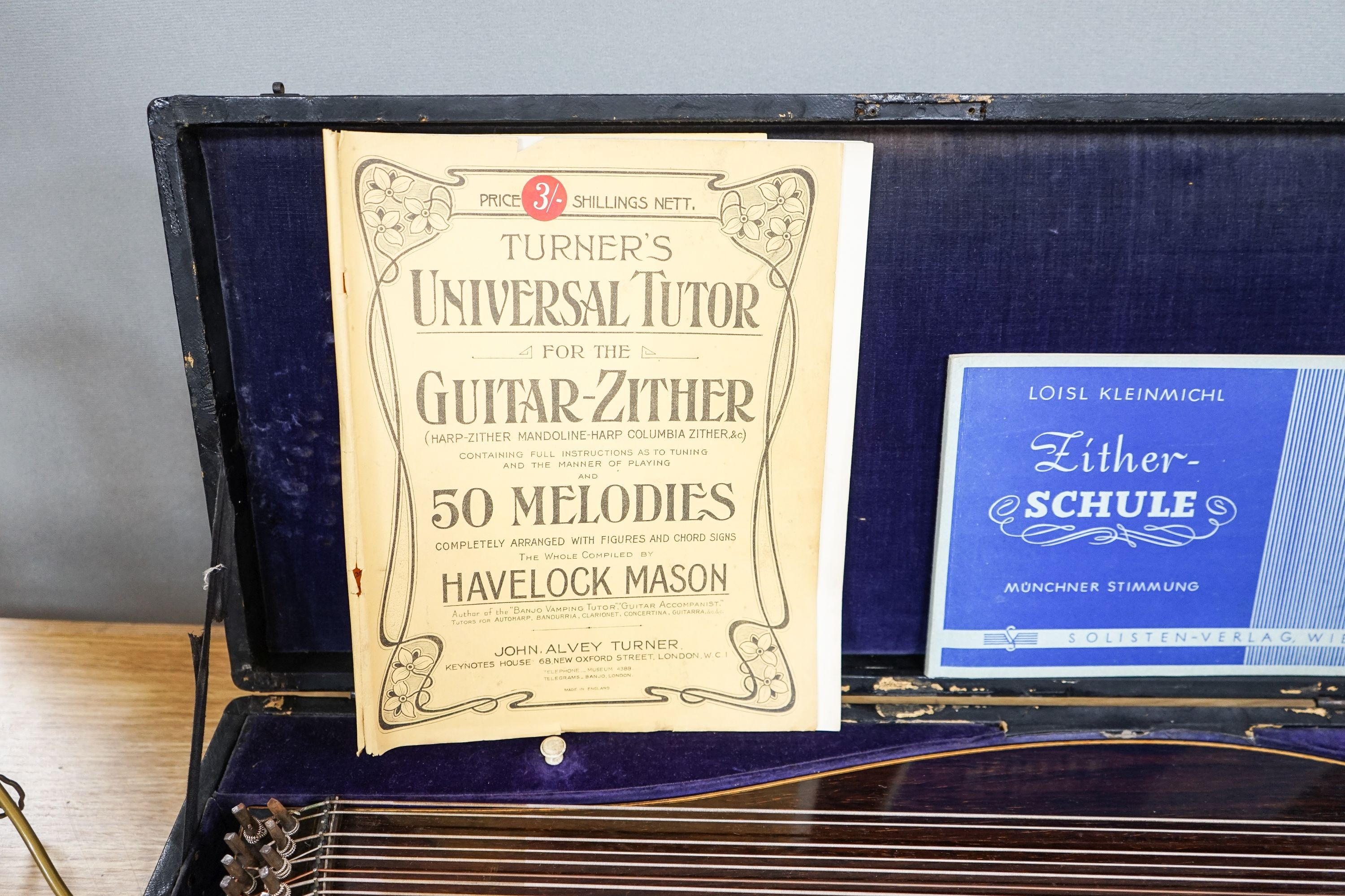 A cased J.Haslwanter guitar zither